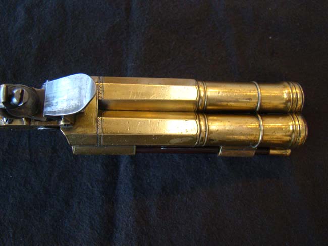 A RARE English Brass Double Cannon Barrel Flintlock Pistol with spring bayonet by Dawes, London, circa 1790. — image 2